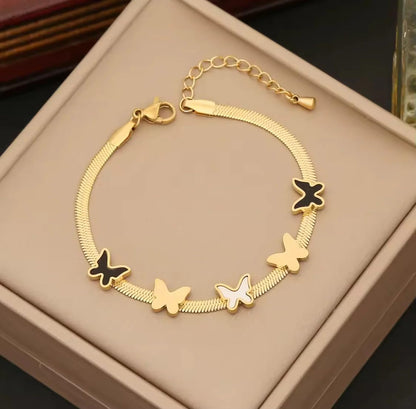 Elegant Gold Butterfly Jewelry Set for Women Includes Necklace Bracelet and Earrings with Black and White Accents Perfect for Gifting and Everyday Fashion