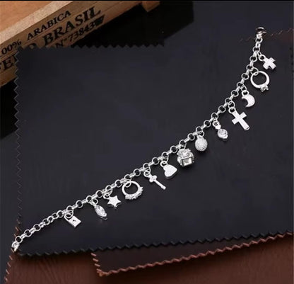 Elegant Silver Charm Bracelet with Crystal Accents Featuring Heart Cross Key Ring and Fashion Charms for Women