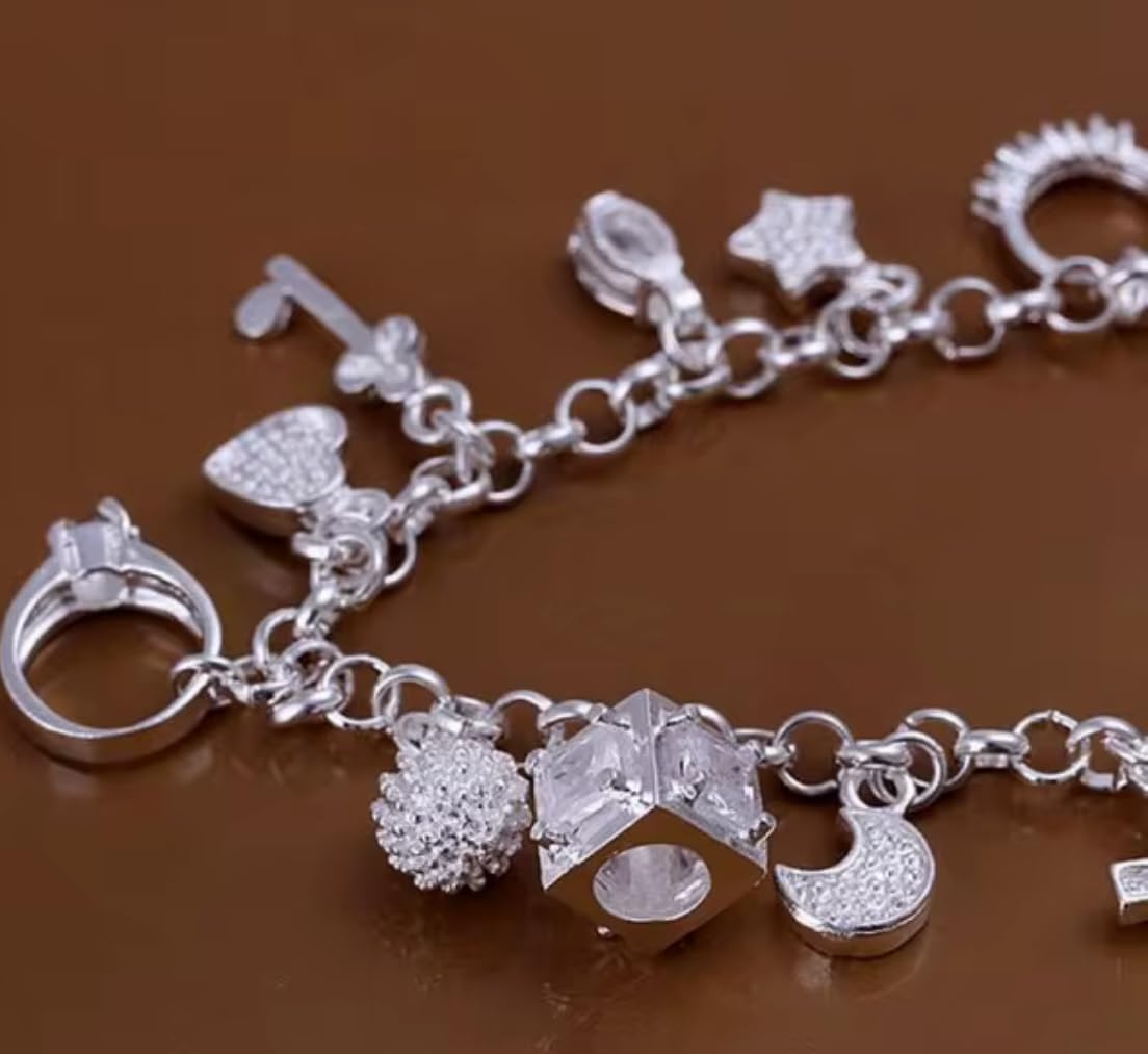 Elegant Silver Charm Bracelet with Crystal Accents Featuring Heart Cross Key Ring and Fashion Charms for Women