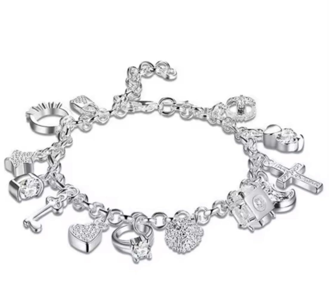 Elegant Silver Charm Bracelet with Crystal Accents Featuring Heart Cross Key Ring and Fashion Charms for Women