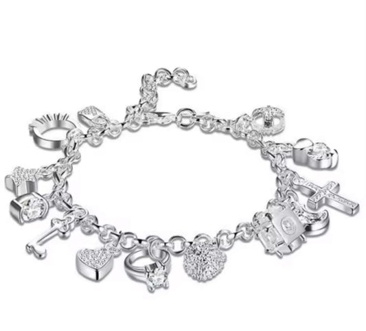 Elegant Silver Charm Bracelet with Crystal Accents Featuring Heart Cross Key Ring and Fashion Charms for Women