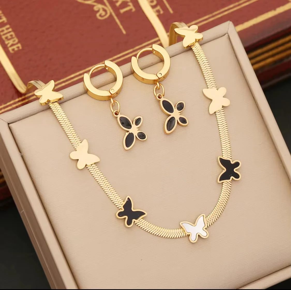 Elegant Gold Butterfly Jewelry Set for Women Includes Necklace Bracelet and Earrings with Black and White Accents Perfect for Gifting and Everyday Fashion
